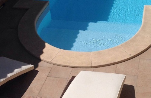 Pogliano Milanese Villa | Villa Le Tre Palme . Suite in relax . immersed in the green garden with swimming pool