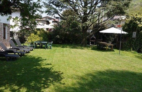 Porto Ceresio Villa | Villa Raggio di Sole is a villa in Porto Ceresio, Italy, on Lake Lugano