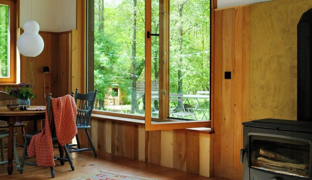 Creatively converted wooden shed in the forest