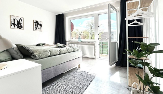 Modern vacation apartment near the center/train station with WiFi & parking space