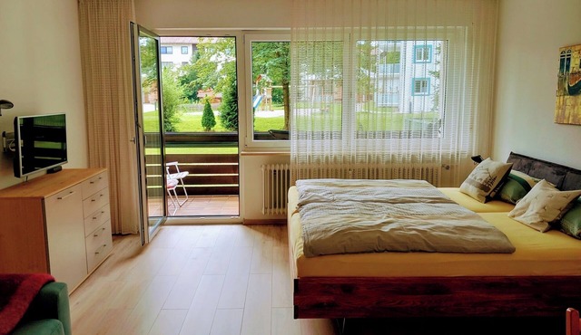 Studio Apartment 'Isarnähe' with shared garden, balcony and wifi