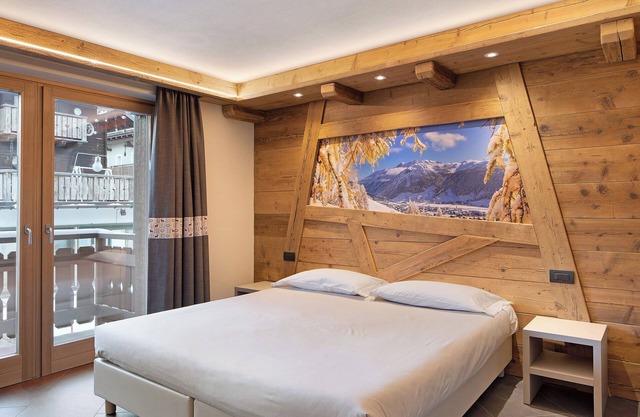 Apartment 'Rasia Residence Relax' with Mountain View, Shared Garden and Wi-Fi