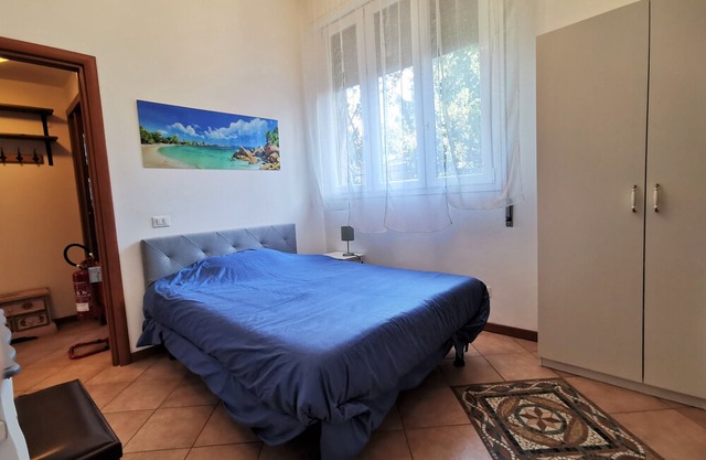 Large apartment in a detached villa with garden