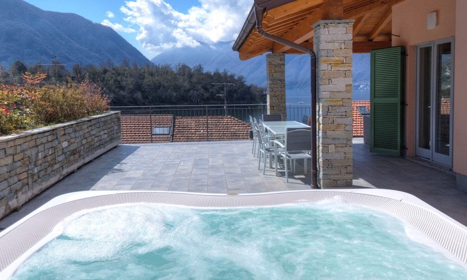 Ossuccio Villa | Comacina lake view private Villa family sleeps 14 guests with featuring hot tub.