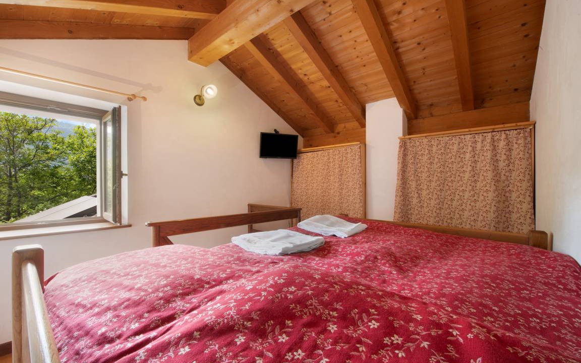 Photo of Bedroom in Dosso del Liro