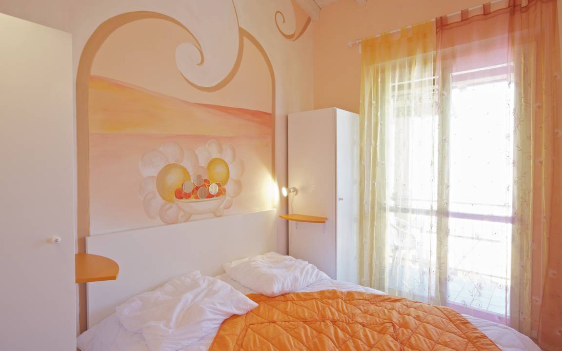 Photo of Bedroom in Maccagno con Pino e Veddasca