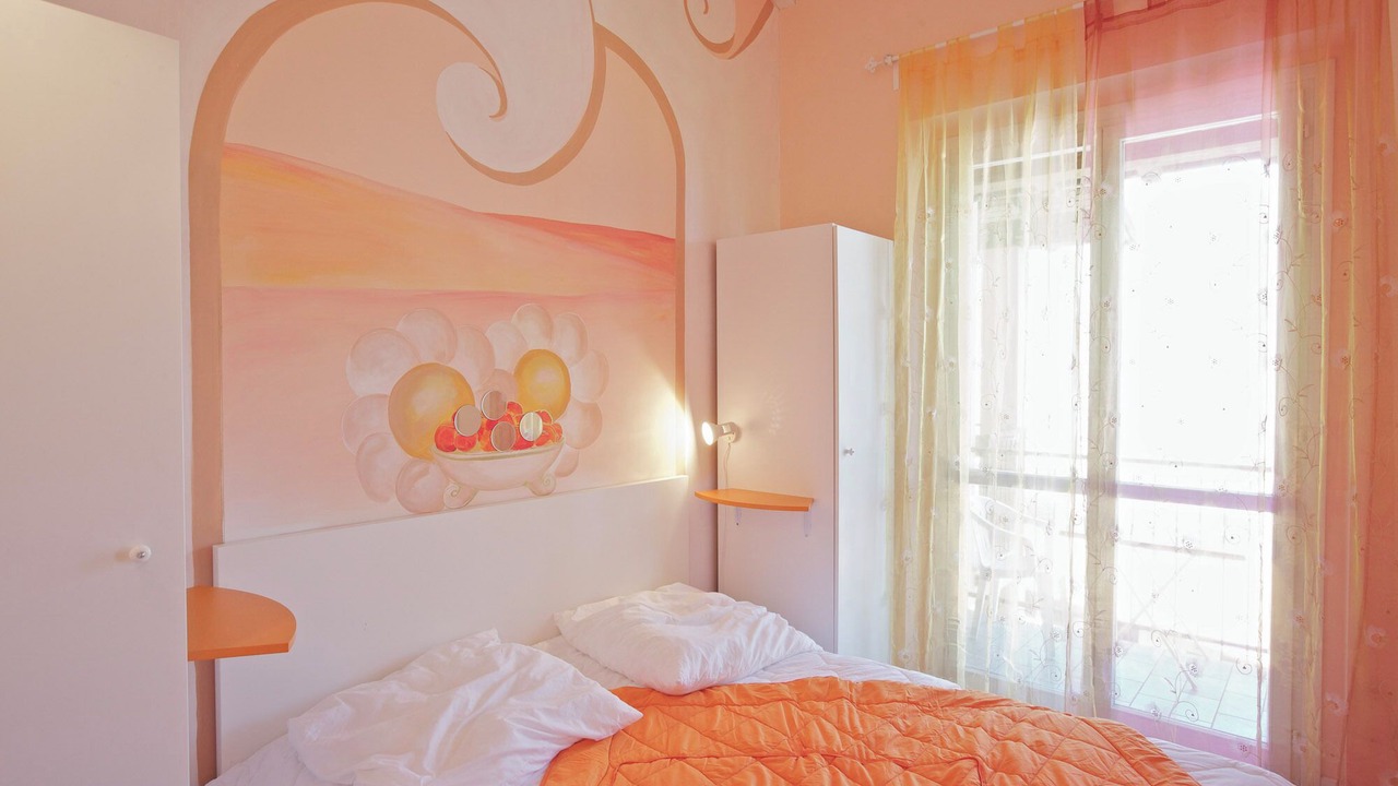 Photo of Bedroom in Maccagno con Pino e Veddasca