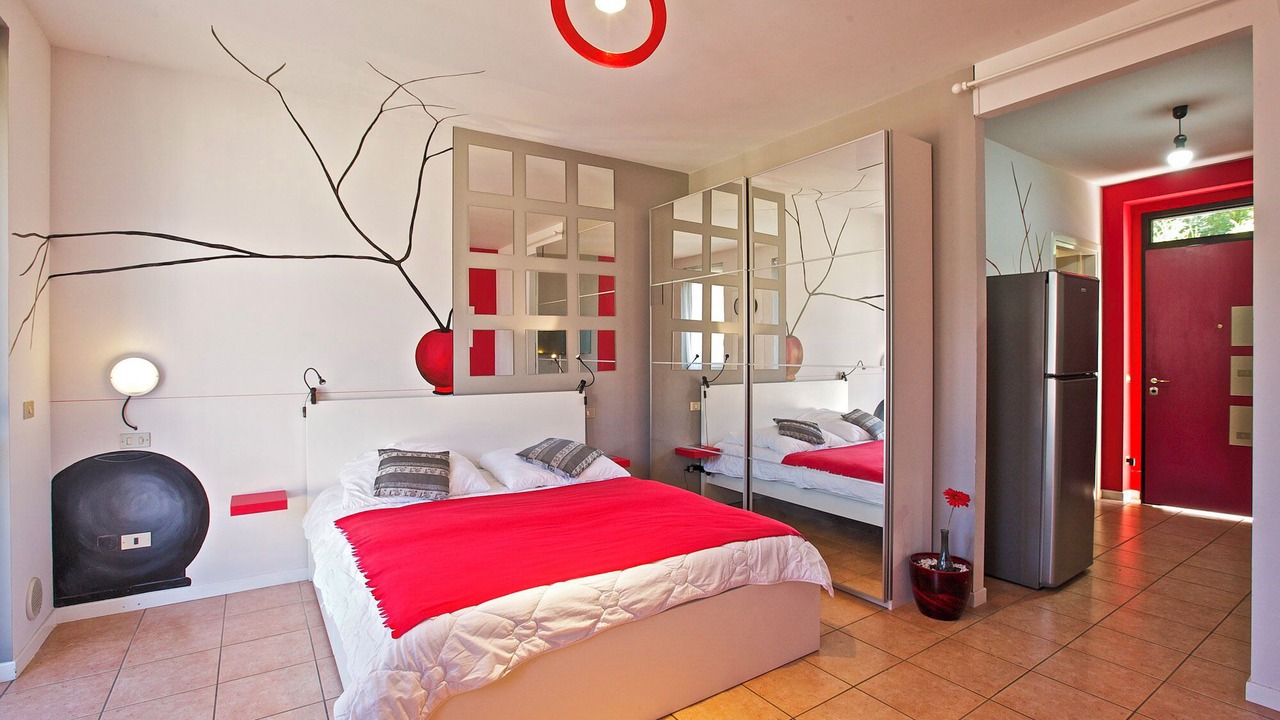 Photo of Bedroom in Maccagno con Pino e Veddasca