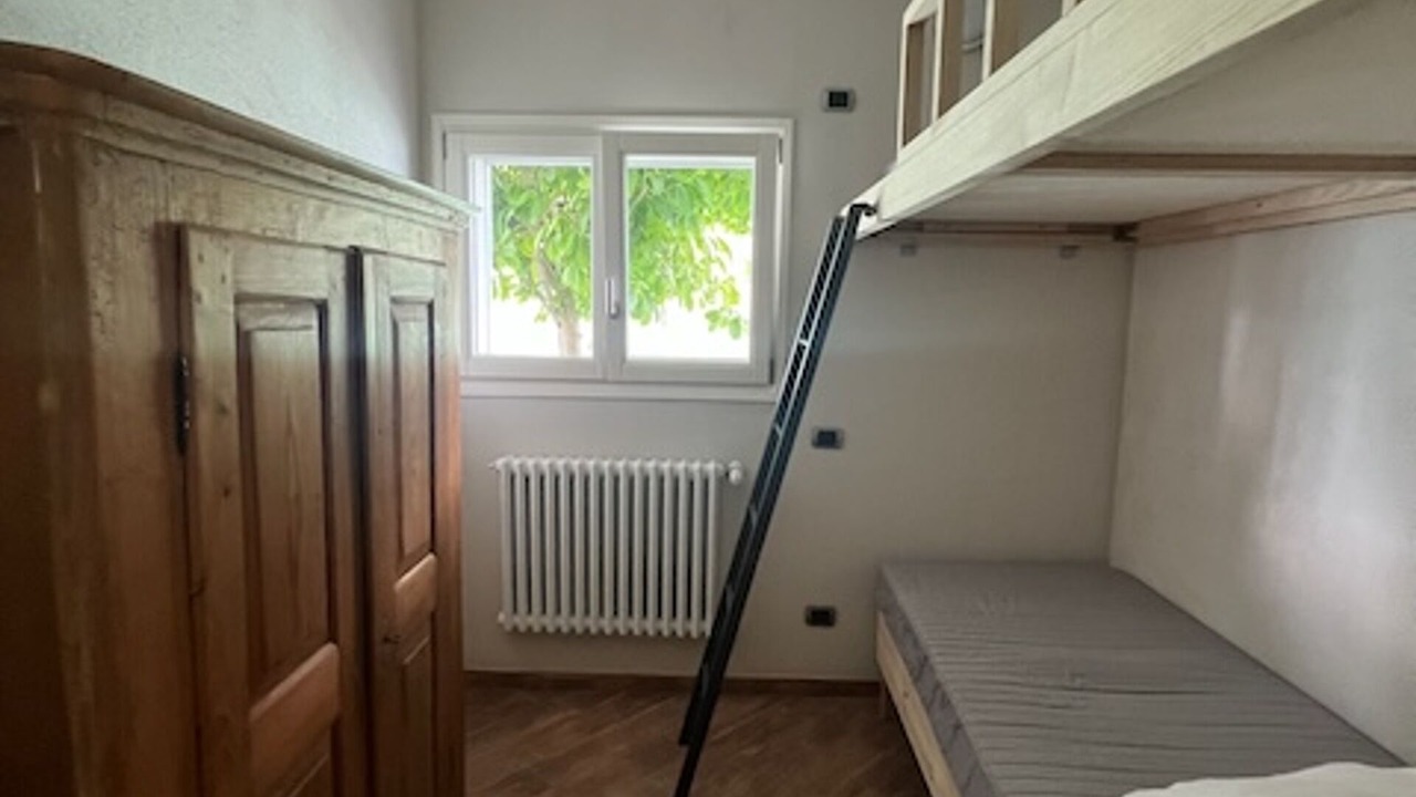 Photo of Bedroom in Claino Con Osteno