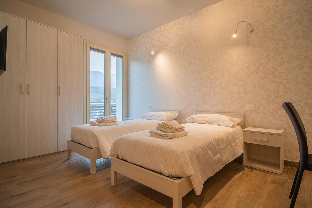 Photo of Bedroom in Cividate Camuno